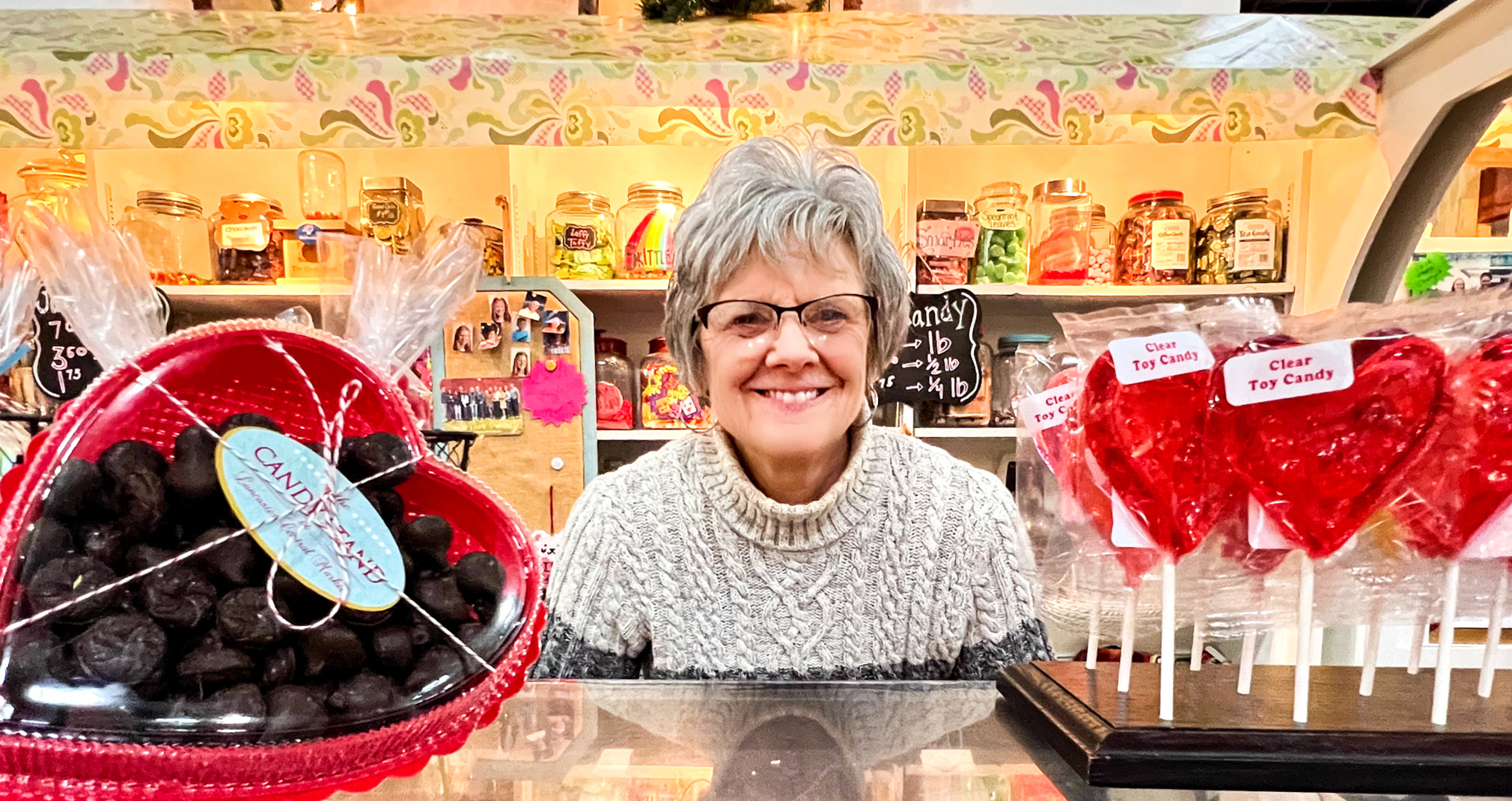 The Candy Stand The Candy Stand here at Market is owned and operated by Ann and Richard Miller. Your visit will be met with a warm smile from Ann, along with an abundant selection of candies sure to satisfy even the most serious of sweet teeth. Favorites include Groff, Fitzkee, and Wilbur chocolates, along with fruit slices, rainbow coconut strips, and Asher’s Turkish paste. Swing by for a sweet treat!